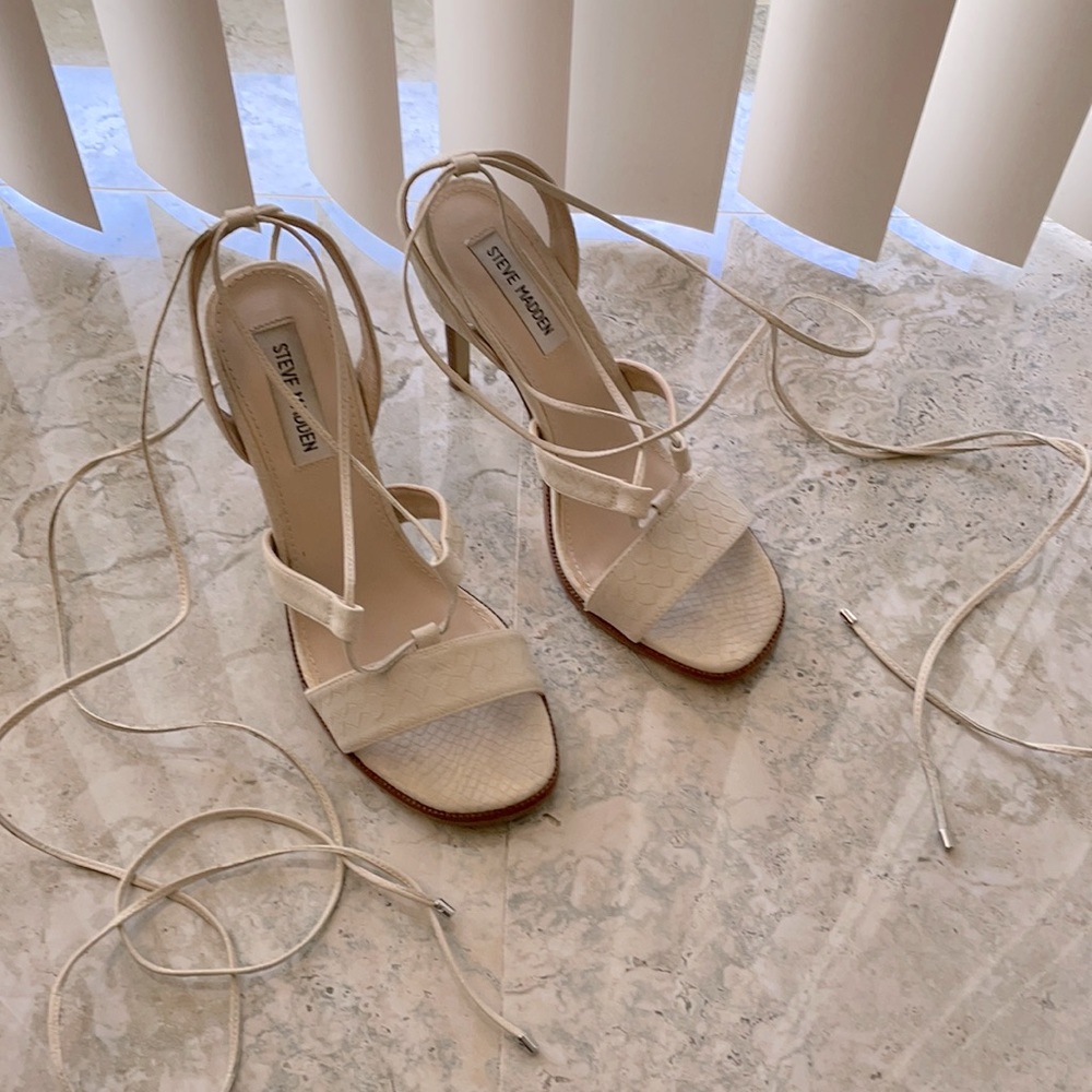 Cream Steve Madden strappy heels.